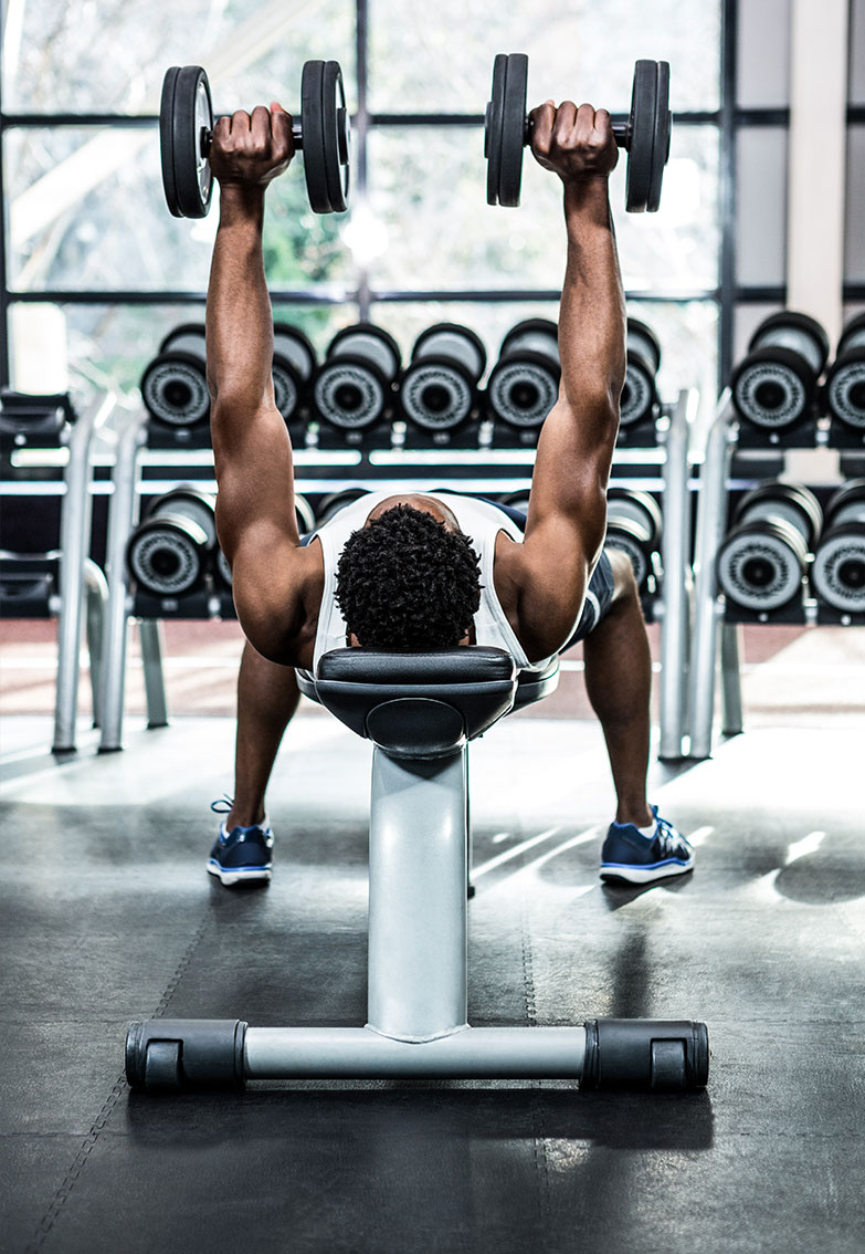 man bench lifting weights